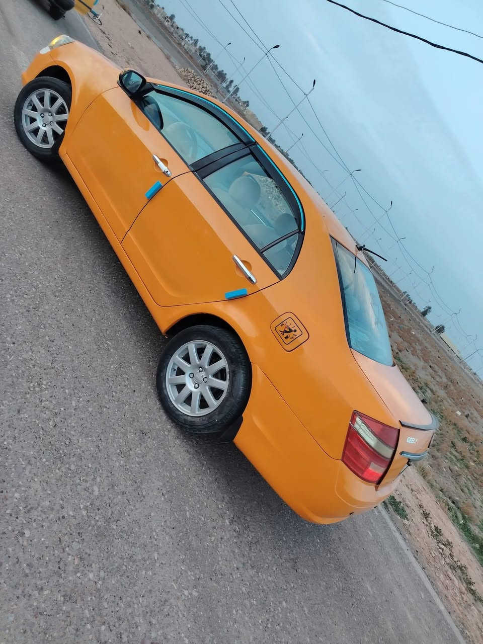 جيلي موبل موديل ١٢ رقم بابل انكليزي بأسمي مصفره هيأه وغرامات خط جوال سيارة نضيفه خير من الله سعر ٤٠وبيها مجال رقم الجوال *********** مكان الديوانية
