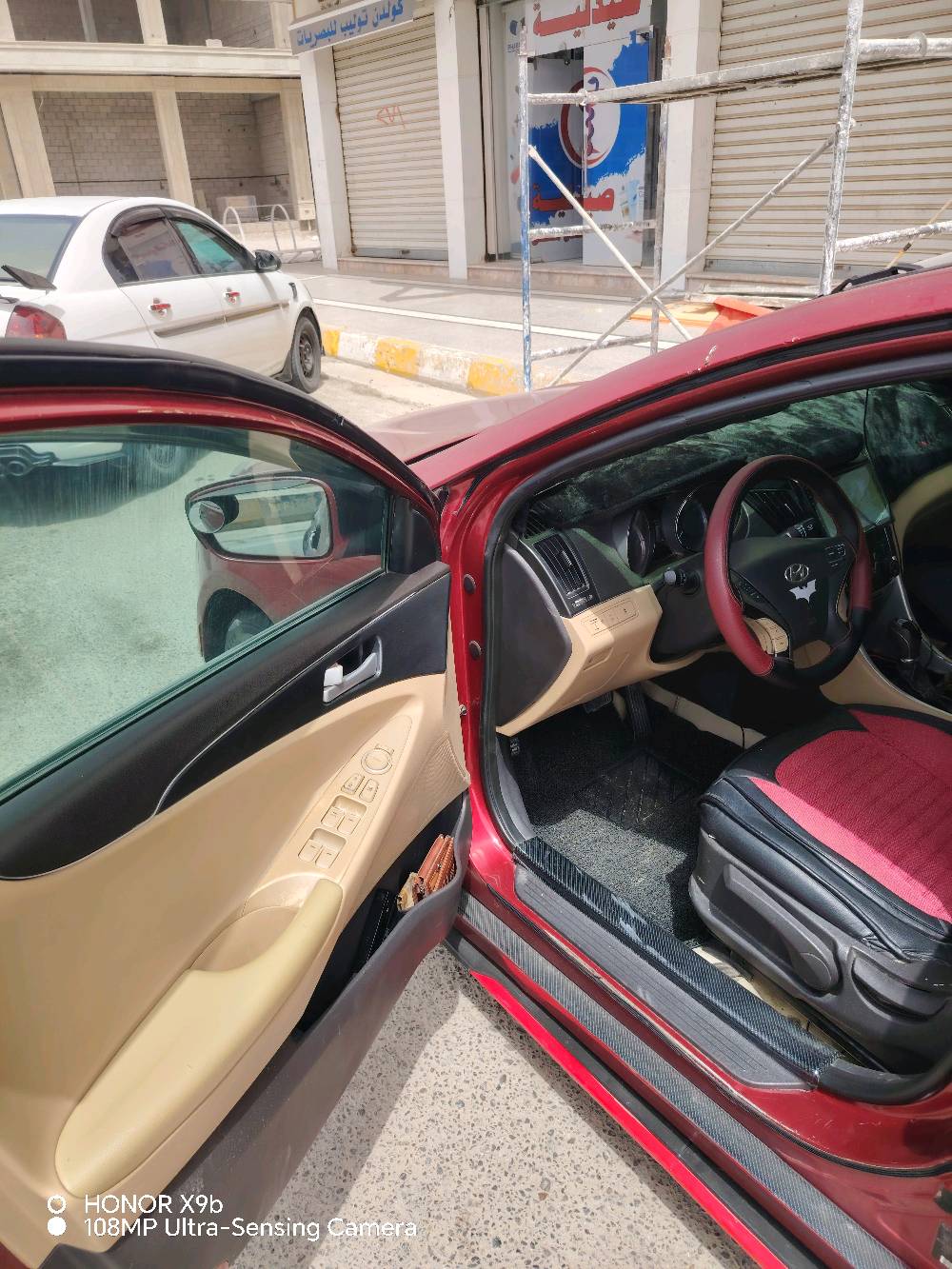 سوناتا موديل ٢٠١٣ وارد أمريكي بسمي شرط التحويل كير ومحرك خير من الله مكينه 2400 لون احمر ماروني مميز رقم كركوك تبريد تدفئه خير من الله