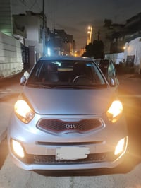 كيا بيكانتو موديل 2015 رقم بغداد لون سلفر ماشية 39500 الف كم نظيفة بدو...