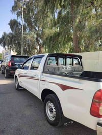 هايلوكس موديل ٢٠٠٦ سعودی بتل شاسی نوزدە جوار جام کارەبا سەیارەی مالی د...