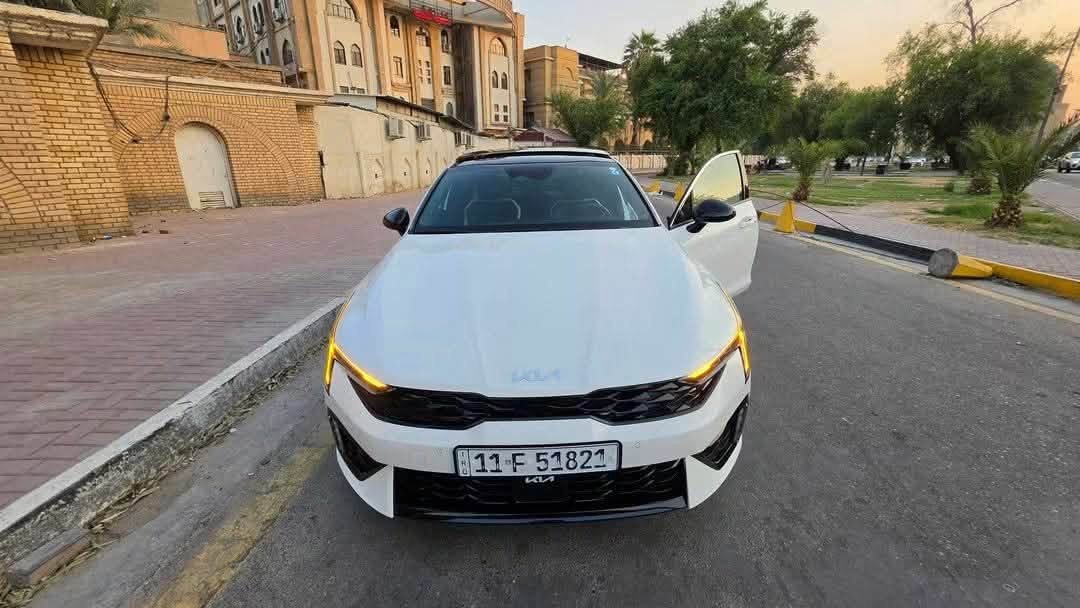 🚘🔥 KIA K5 GT-LINE 2026 🔥🚘

✅ سيارة مكفولة كفالة عامة 🛡️
❄️ تبريد وتدفئة 🔥❄️

✨ المواصفات:
� بصمة دخول وتشغيل 🔑�
📍 فتحة سقف بانوراما 🌤️✨
📍 تدفئة كشنات أمامية 🔥💺
📍 ستيرن تدفئة 🔥🚗
📍 رادارات ٤ اتجاهات 📡🛡️
📍 كاميرا خلفية 📷
📍 تحكم باتجاه المرايا الجانبية 🪞
📍 كشن السائق كهرباء ⚡💺
📍 جام ٤ أبواب ضغطتين 🪟⬆️
📍 محرك 2500 تنفس طبيعي 🔥💪
📍 كشنات جلد 🛋️✨
📍 تحكم ستيرن كامل 🎛️
📍 شاحن وايرلس 📱⚡

💥 الحادث:
🔹 قبغ جنطة راجع بارد 🧊
🔹 تعديل مقدمة الحوض بارد 🔧
🔹 تبديل دعامية أصلية 🛠️
🔹 إيرباك برده طاك 💥
🎨 السيارة بدون صبغ نهائياً ✨

📏 ماشية: 5,000ر كم 🛣️
💰 السعر: 222 💵🔥

📍 العنوان: بغداد / الأعظمية 📌
📞 للاستفسار:(tel:***********) ☎️
