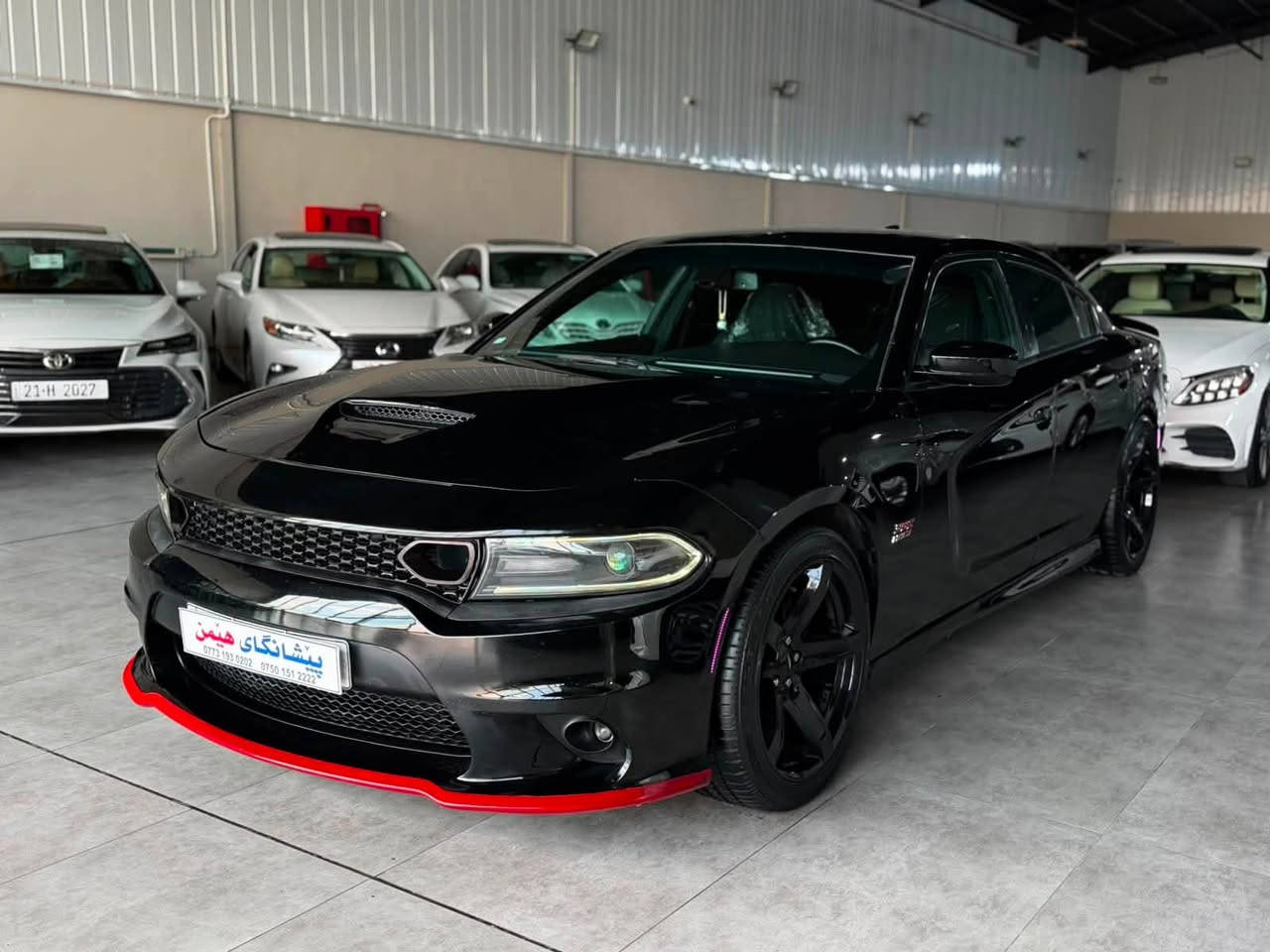 ﷽
‎‏                    DODGE CHARGE 2017 R/T
◽️دوج جارجر موديل 2017 R/T
فول مواصفات ماعدا فتحة
🔹لون ( اسود قتران ) 
~~~~~~~~~~~~~~~~~~~~~~~~~
◽️مكان🌆:سليماني                    سعر💵: 173$🔐
تليفون☎️: ***********
                 *********** واتساب
~~~~~~~~~~~~~~~~~~~~~~~~~
◽️محرك V8 5.7L تمانية سلندر🔥🚀
🔹گير و محرك بشرط
🔹بدون صوت بدون صرف بدون خلل بشرط فحص
🔹ماشية 67 الف حقيقي

◽️سيارة كامل محدث هيلكات🔥  
🔹 بيها برمجات شاشه و گيج و صوت صالنصا 🔥🔥
🔹محدث بنيت و دعاميات ويل و لحيات و دوسات سبايدر دفيوزر كل محدث هيلكات 🔥

▫️سيارة داخل بلعرق كلين تايتل
🔹 صار بلعراق ( جملغ خلفي عكس سايق صبغ بدون دواخل و بونيد محدث هيلكات) 
🔹ايرباگ راجع سيستم بيلادي شرط
🔹سيارة حيل حيلوة جديد  

◽️مواصفات فول مواصفات
( بصمة - شاشة كبير - تشغيل عن بعد - كشن تتفيئة - كشن خزن و كهربا - پادل شفت - كاميرا - حصاص - ڤوليوم - تحديد سورعة - بلاجكتور - بعد )

◽️اربع تاير ويل جديد هيلكات
🔹نظافه ١٠٠٪؜ كامل سيرفس بدون نقص و بدون مصرف
🔹سيارة شرط بدون اى نواقص گير و محرك و حدادي و كاهرباى كولة بشرط
سنوي بأسمي تحويل غرامة بشرط سنويه جديد
~~~~~~~~~~~~~~~~~~~~~~~~~~~~~~~~
