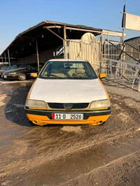 بيجو 405GLX • مكفولة • تكييف ثلج