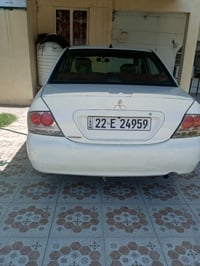 لانسر 2010 • سنوية 2030 • تراوس سبورتج/توسان/سورنتو