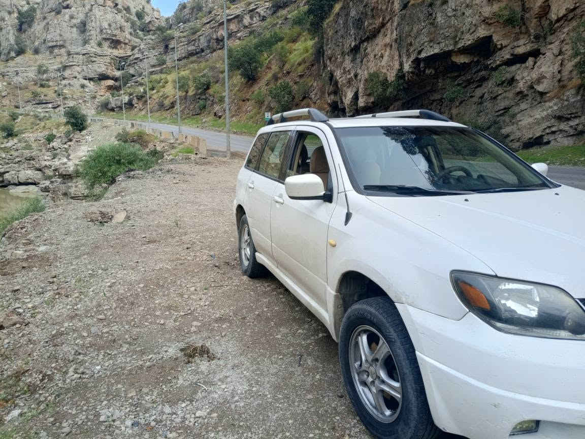 اوتلاندر ٢٠٠٣ • دبل اكسل AWD • اوتوماتيك