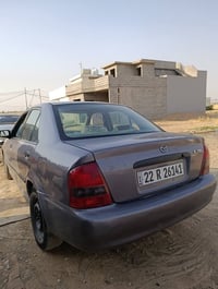 مازدا ٣٢٣ • ٢٠٠٤ • اربيل