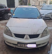 لانسر ٢٠١٠ • محرك ١٥٠٠ • رقم بغداد