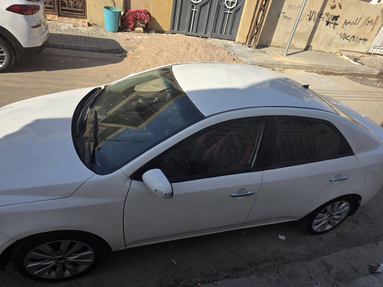 سياره كيه سيراتو مديل ١١ خليجيه سياره رقم اصلي سنويه سنساخ بس رعايه ما ندله نبيعك دوات كومت حديد  سياره كفاله كص مجفيه فقط رقم ربيل ألماني كير مكينه حداديه جديده تخم تاير جديد رقم الجوال ***********
