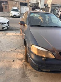 اوبل استرا 2002 كير عادي وارد ياباني السيارة نظيفة  وكاملة مكملة بلادي...