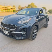 سبورتج 2021 وارد امريكي  رقم بغداد بسمي  مواصفات عادية  سياره ماشية ٣٠...
