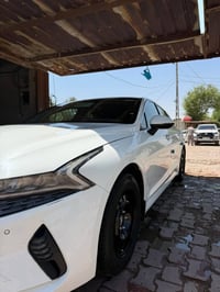 K5 موديل ٢٠٢٣ • رقم بغداد • ماشي ١٠٨٠٠٠