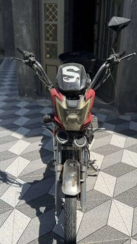 دراجه شحن • بطاريه • واكفه