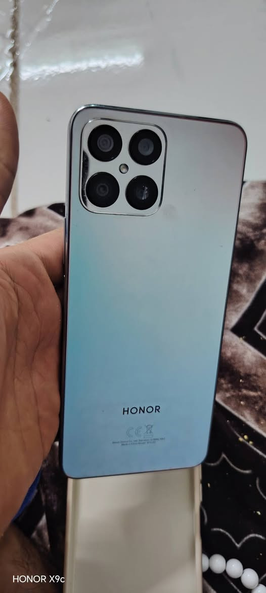 150

نص مكتوب في الصور:
- حول الهاتف
- MagicOS
- 7.1
- اسم الجهاز HONOR X8
- الموديل TFY-LX2
- رقم الإصدار 7.1.0.296(C185E7R3P4)
- GPU Turbo
- إصدار MagicOS 7.1
- إصدار الأندرويد 13
- IMEI 865414063181926
- 865414063202938
- المعالج المركزي Qualcomm Snapdragon 680
- ذاكرة الوصول العشوائي ٦ غ.ب + ٢ غ.ب
- (HONOR RAM Turbo)
- HONOR X9c