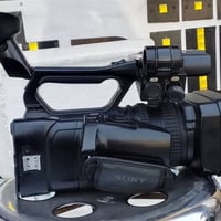 سوني NX100 • نظيفة • بطارية أصلية