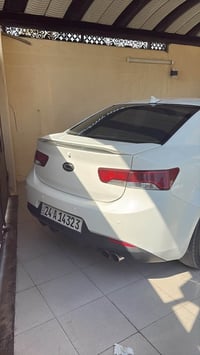 كيا سيراتو 2010تك باب رياضي  كير محرك صدر  تبريد تايرات  كلو جديد  سيا...