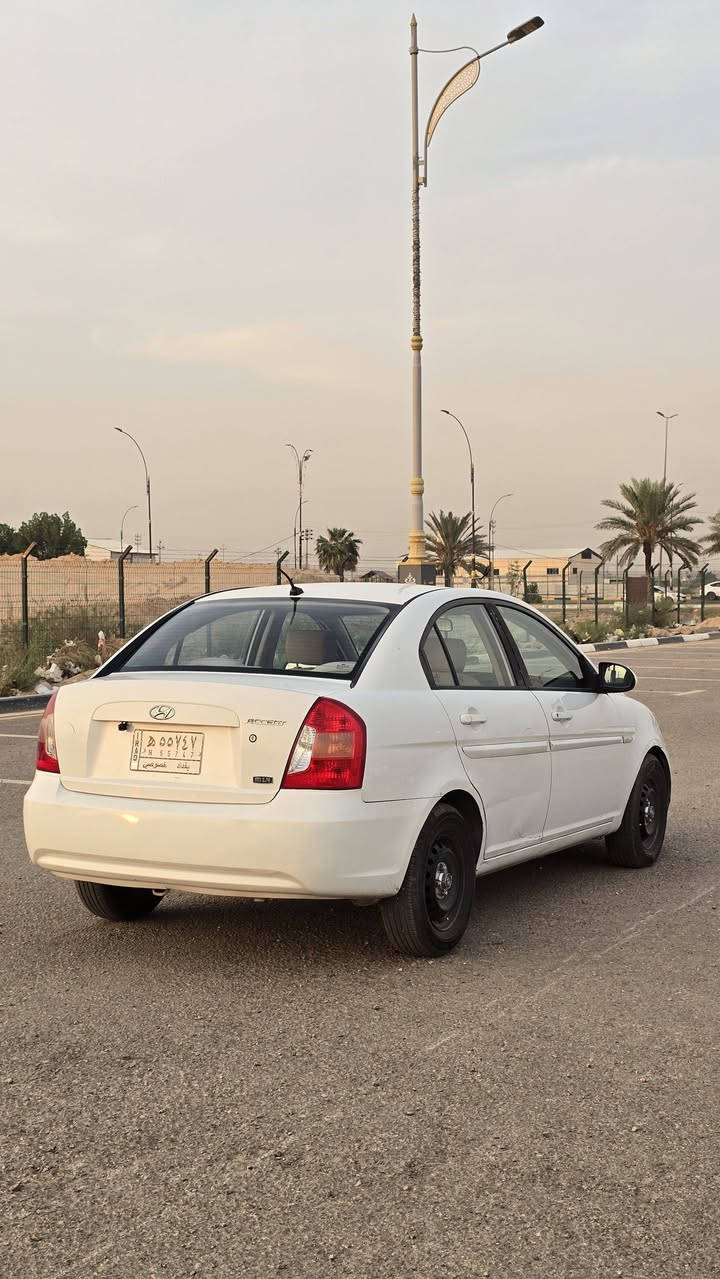 اكسنت ٢٠٠٩ • مكفولة جير ومكينة • رقم بغداد