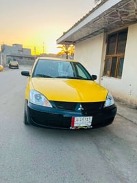 لانسر ٢٠٠٩ • اوتوماتيك • مكينة ٢٠٠٠