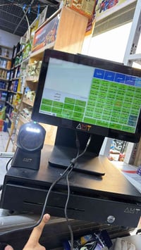 كاشير مع قارئ باركود مع جرارة  منزل بي كل ايتماات من شركة AMT للبيع مك...
