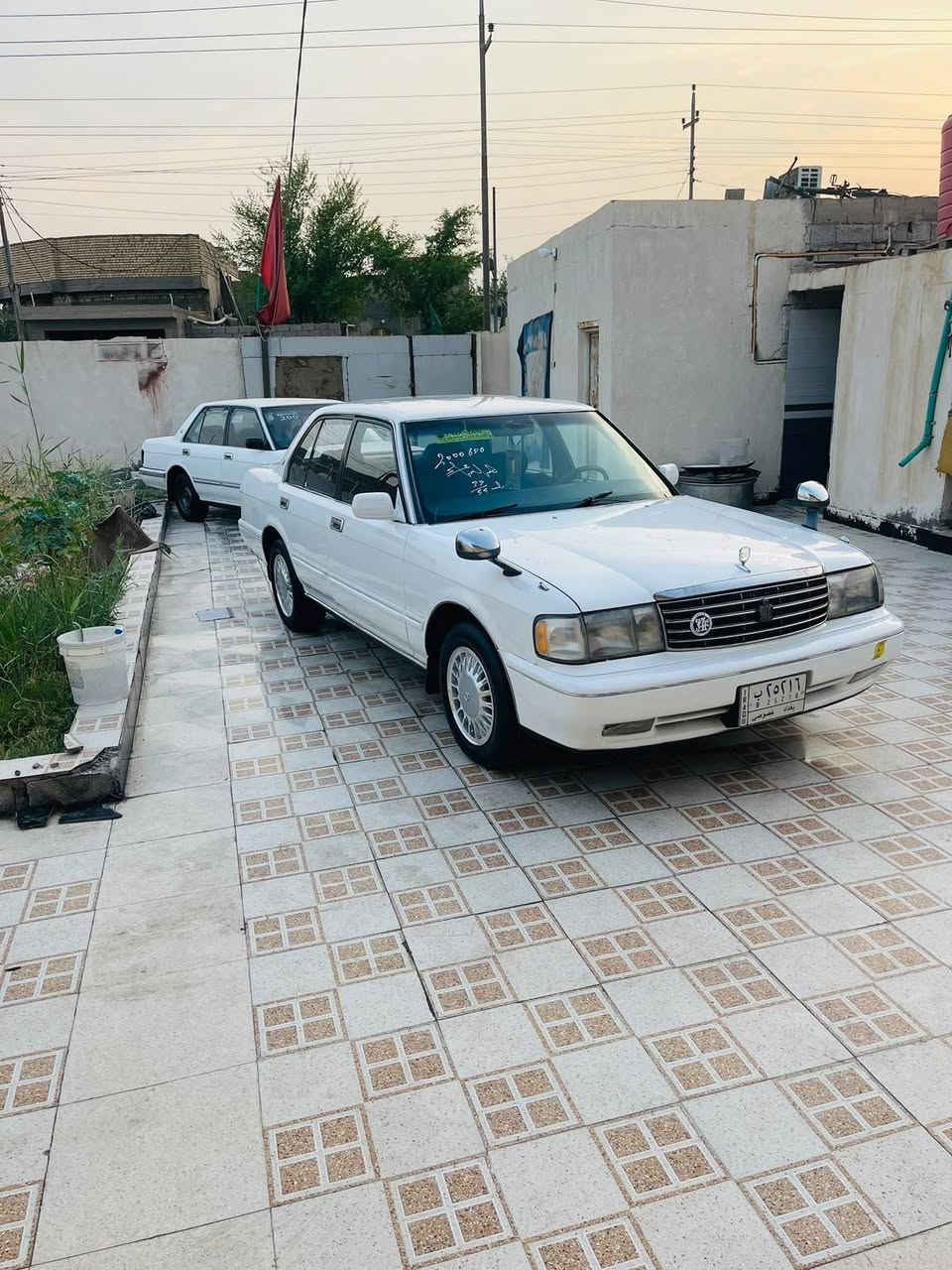 كورولا ٩٥ • ابيض • رقم بغداد
