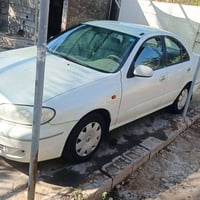 نيسان سني ياباني ٢٠٠٨ رقم بغداد ب اسمي بيهه تكحيل بلكصه بدون اي ضربه و...