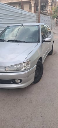 بيجو ٣٠٦ بغداد دولي باسمي موديل ٢٠٠٢ المحرك بي تبخير التبريد شغال سيار...