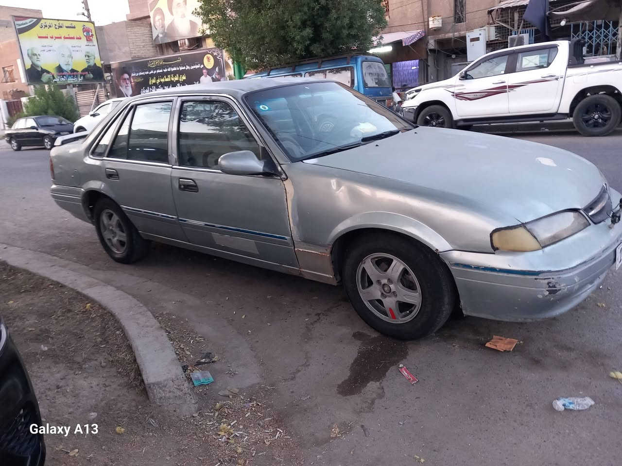 السلام عليكم البرنس فراشه للبيع موديل 96 رقم بغداد دولي باسمي سياره خير من الله عدد السعر 25 وفيها مجال تبريد مكان بغداد حي العامل/***********

نص مكتوب في الصور:
- Galaxy A13