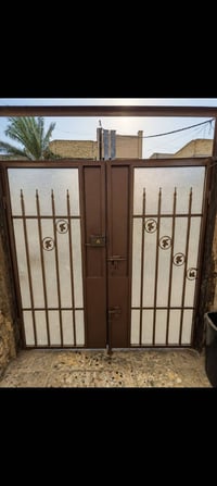 باب خارجية حديد الارتفاع 180والعرض180 بغداد الجديده النعيريه هاتف 0771...