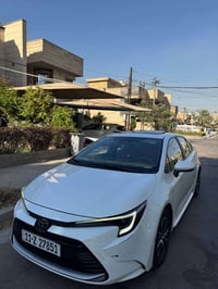 تويوتا كورلا هايبرد🚗 الشكل الامريكي 🇺🇸 الموديل : 2024 اللون : ابيض  ما...