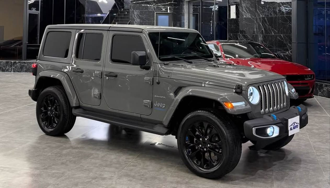 Jeep Wrangler Sahara  2023 hybrid  4XE سمنتی
mi : 58,000 mi
Engine : 2.0L Turbocharged - Hybird 
HorsePower: 375Hp
Sensors : No 
Wheel size: 20-inch wheels
Camera: 1 camera
Screen: 1 big screen
Seats Type: Heated
Sound system: Alpine
رقم شاصی : 
1C4JJXP68PW580576
فقط واحد قطع صبغ 
موبايل : *********** دهوك, العراق

نص مكتوب في الصور:
- 6/7
- 7/7