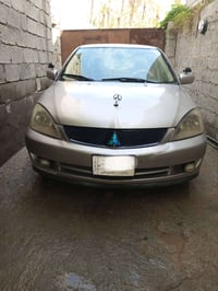 لانسر 10 • مكينة 2000 • رقم بغداد
