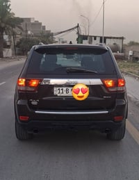 جيب كراند شيروكي اوفرلاند   موديل 2011 محرك 5700 هيمي رقم بغداد سياره ...
