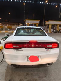 جارجر للبيع موديل 13 وارد كندي مكفوله ما عده بارد الباب الخلف السائق و...