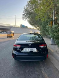 كورلا 23 اسود بيه جاملغ خلفي صبغ وباب خلفي وبارد إصبع بل بنيد مامبين س...
