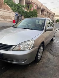 لانسر • ٢٠١١ • ١٨٠٠٠٠كم