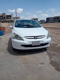 بيجو ٢٠٠٥ حجم ٣٠٧  سياره جاهزه تبريد تدفئة رقم بغداد باسمي الضرر صبغ ب...