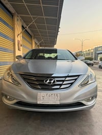 سوناتا موديل 2012 أمريكي ماشيه 133 ميل حقيقي محرك 2400  رقم  بغداد باس...
