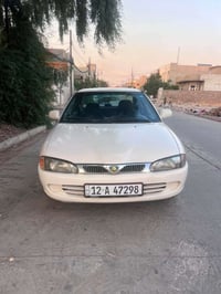 بروتون • ٢٠٠٢ • مكينه وكير شرط