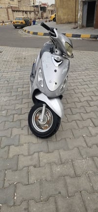 دراجة • بغداد • عل ابلاد