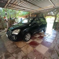 كيا ريندو 2009 للبيع رقم بغداد سياره جاهزه من كل شيء مكاني حله المحكمه...