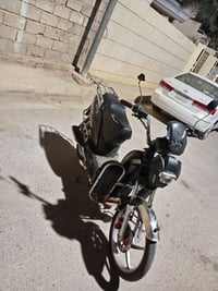 دراجة شحن • بطاريات نص عمر