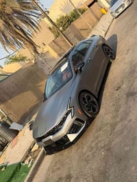 K5 ٢٠٢٥ • محرك ٢٥٠٠ • جلد احمر