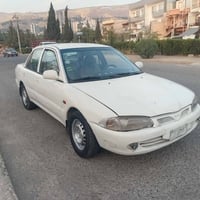 پروتون • ٢٠٠٢ • كاربراتير