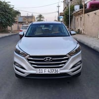 هونداي توكسان 2018 محرك2000 رقم بغداد انكليزي باسمي ماشيه 64 الف حقيقي...