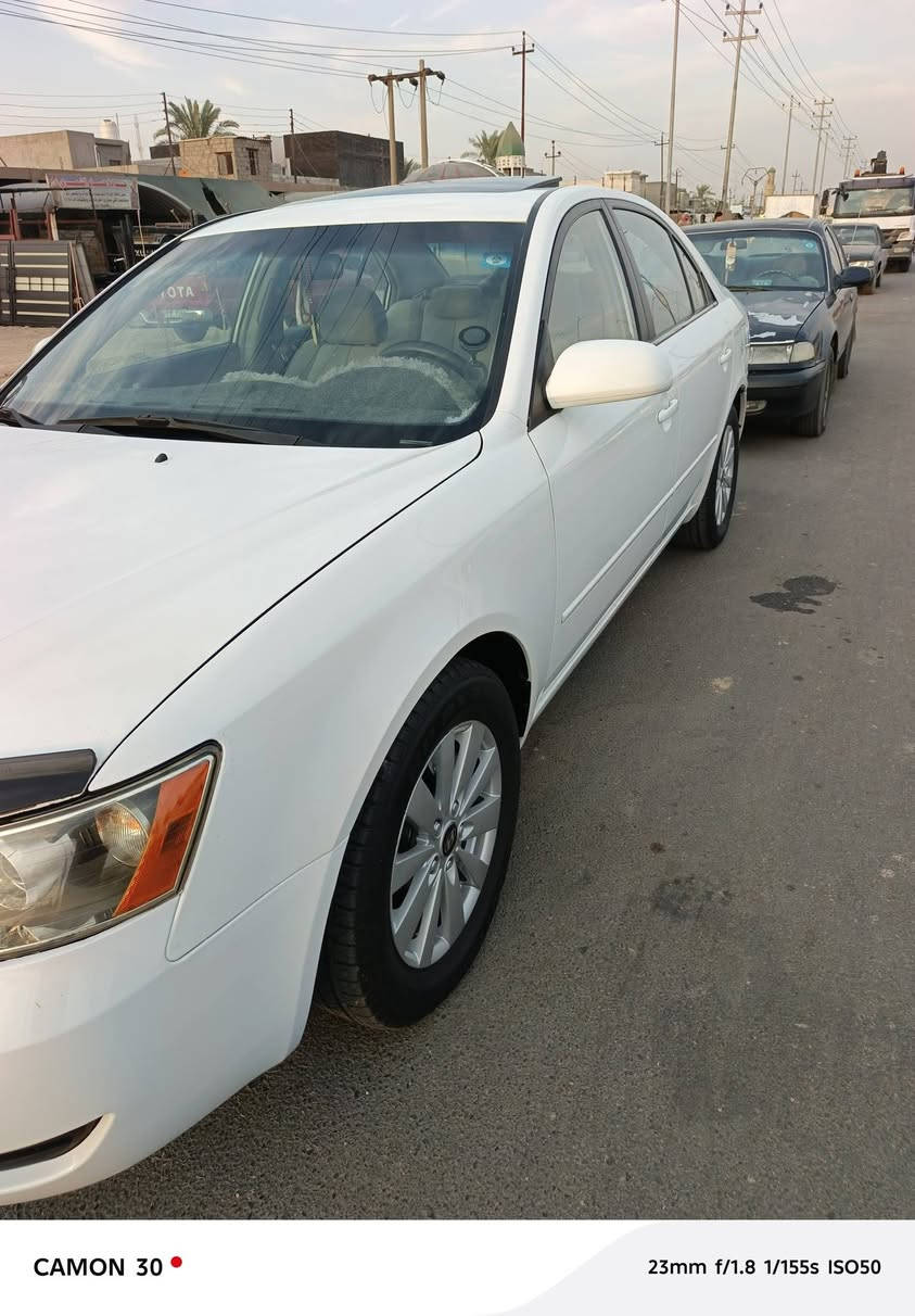 السلام عليكم سوناتا 2008 وارد امريكي محرك 2400 مكفوله من اي حادث ليبل واحد فقط حافة البنيد صبغ سونار مرفق مع الصور بدون اي دواخل لغد حوض تكم شاصي مكفول مواصفات لمتد كشن كهرباء فتحه تحكم فول محرك كير شرط مكفول من الفتح تبريد ثلج تدفئه شغالة شاشه كامره السيارة بحاله ممتازه السعر 112 بيها مجال بسيط حك الجيه مكاني بعقوبه دور الزراعة للتواصل ***********

نص مكتوب في الصور:
- CAMON 30 • 23mm f/1.8 1/183s ISO50
- CAMON 30  23mm f/1.8 1/155s ISO50
- CAMON 30 23mm f/1.8 1/192s ISO50
- CAMON 30
- 23mm f/1.8 1/290s ISO50
- CAMON 30 23mm f/1.8 1/461s ISO51
- CAMON 30 23mm f/1.8 1/246s ISO50
- 23mm f/1.8 1/100s ISO69
- CAMON 30 23mm f/1.8 1/67s ISO72
- CAMON 30  23mm f/1.8 1/100s ISO85