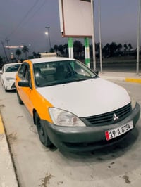 للبيع ميسيبوشي لانسر 2008 وارد امريكي كلين بدون حادث سياره نظيفه و بدو...