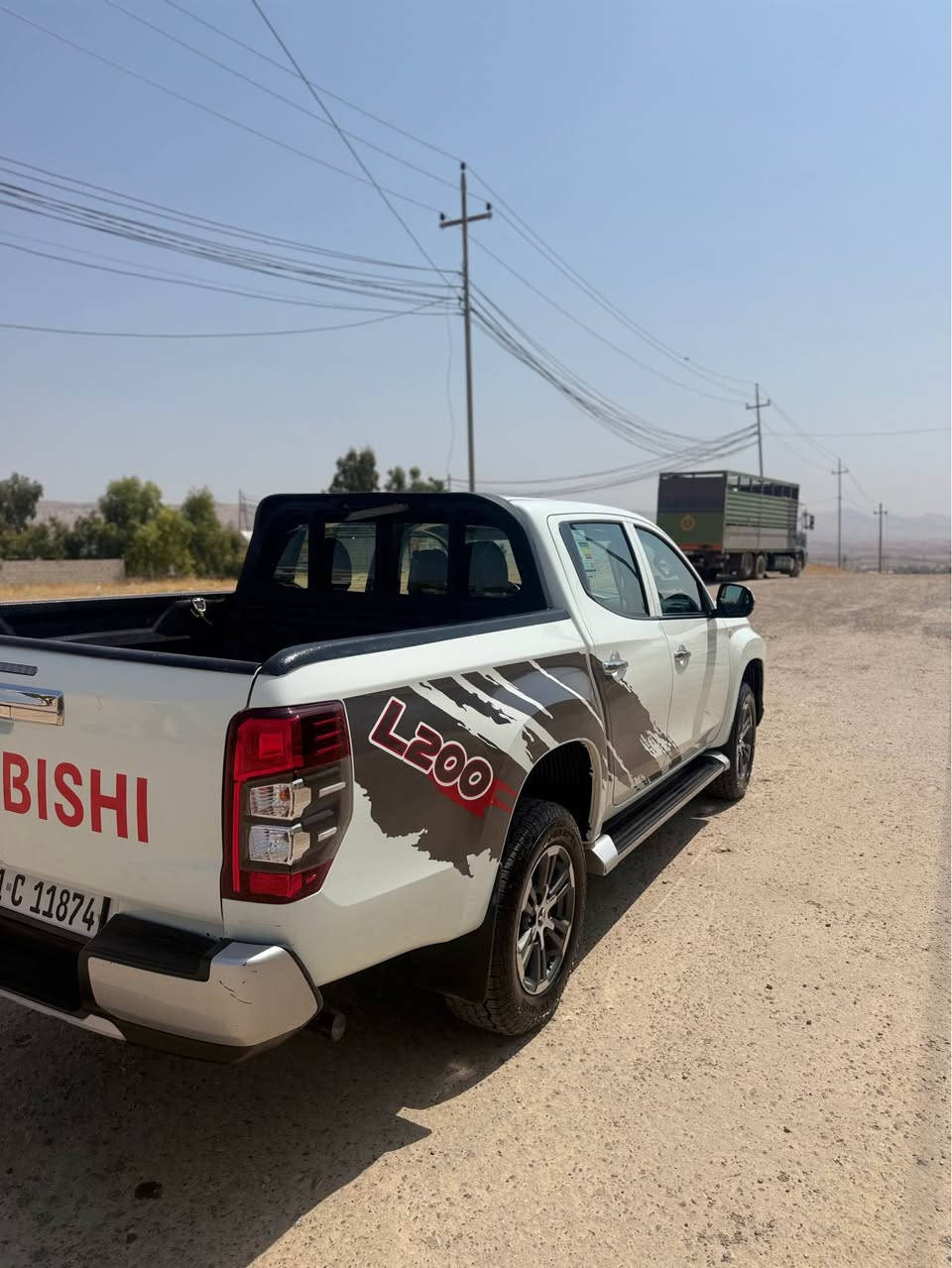 مسته ربوشى L200 موديل ٢٠٢١
ده ره جه يه ك به ردى پيوه نيه ده بل ده عامى 
ويل كه پ فوليوم تاقم تايه ى نيو جه به لى يابانى ئه سل 
چوار په نجه تعديليكى بچوكى هه يه چركه ى تيا نيه سه نه وى نوييه تا ٢٠٣١ به ناوى خومانه 
سعرى ١٧٨ 
*********** كويسينجاك, أربيل
