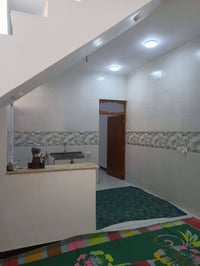 دار 50 متر للبيع اساس صب كونكريت بناء طابوق نهروان سقف صب يتكون من غرف...