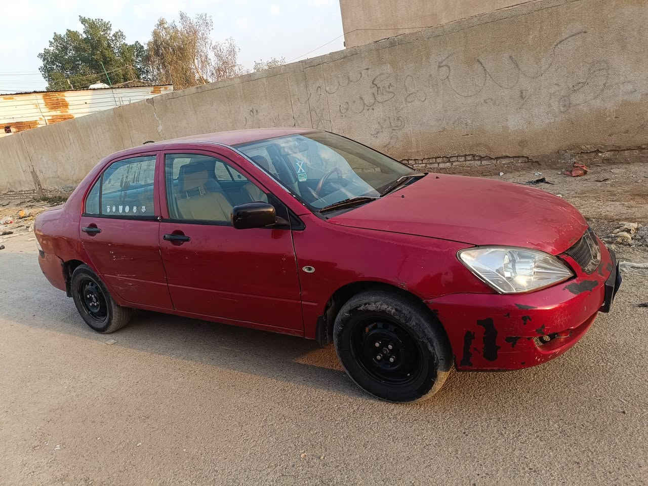 لانسر 2007 ،، رقم بغداد مشروع وطني بأسمي ،، مصبوغة حزام و  المحرك تجفيت قبل 6 اشهر و الگير ما مفتوح ،، حدادية جديدة و الباتري جديد 
مكاني الفضيلية ***********
السعر 58
