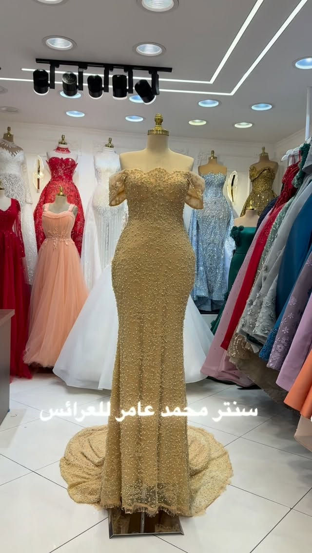 سنتر محمد عامر • الكاظميه • فساتين زفاف