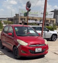 سيارة هونداي i10 لون احمر  موديل 2015 اقتصاديه  عليها ادامه دوريه  كام...